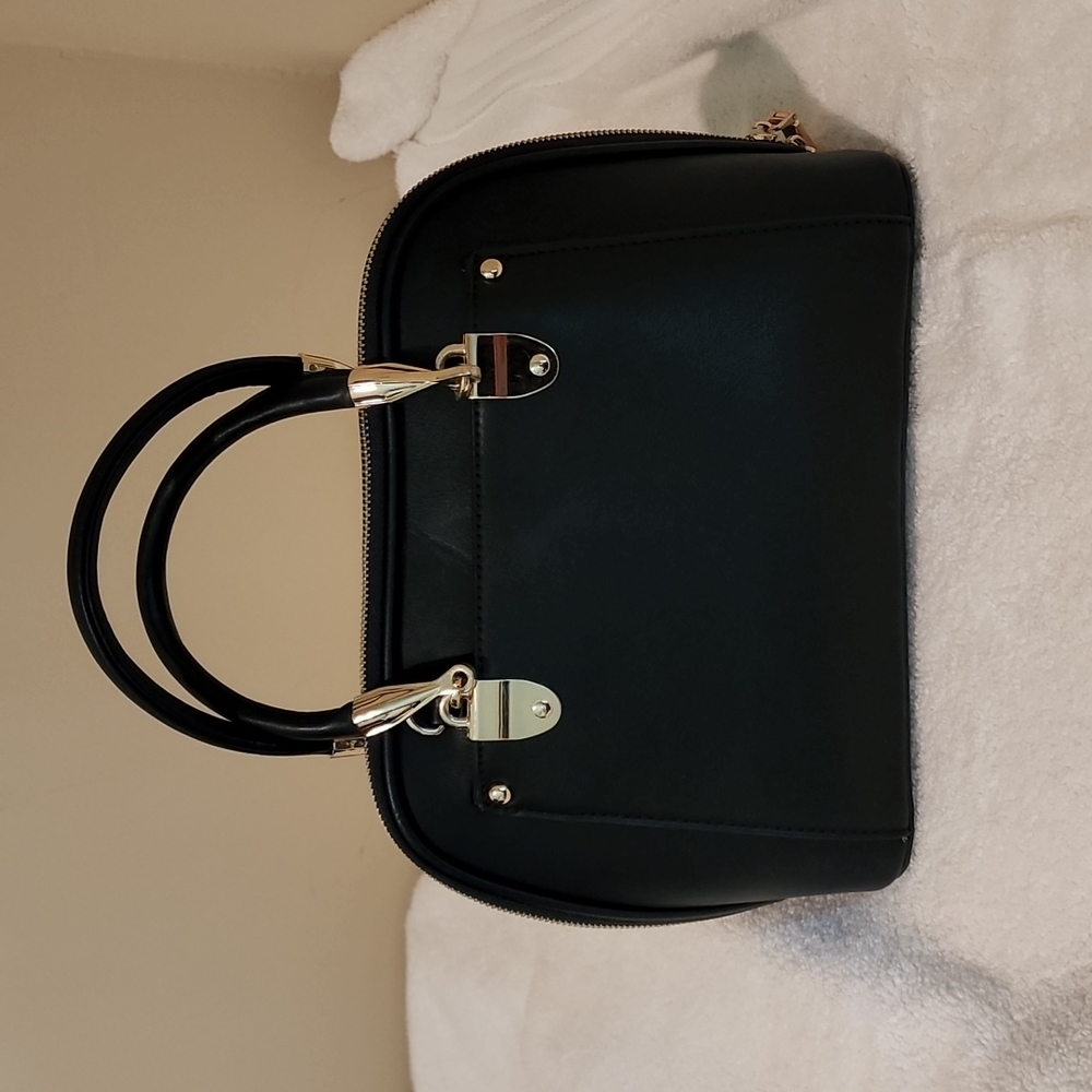 Black leather purse with shoulder strap